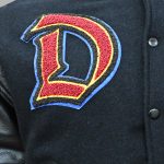 hest custom patch on varsity jacket