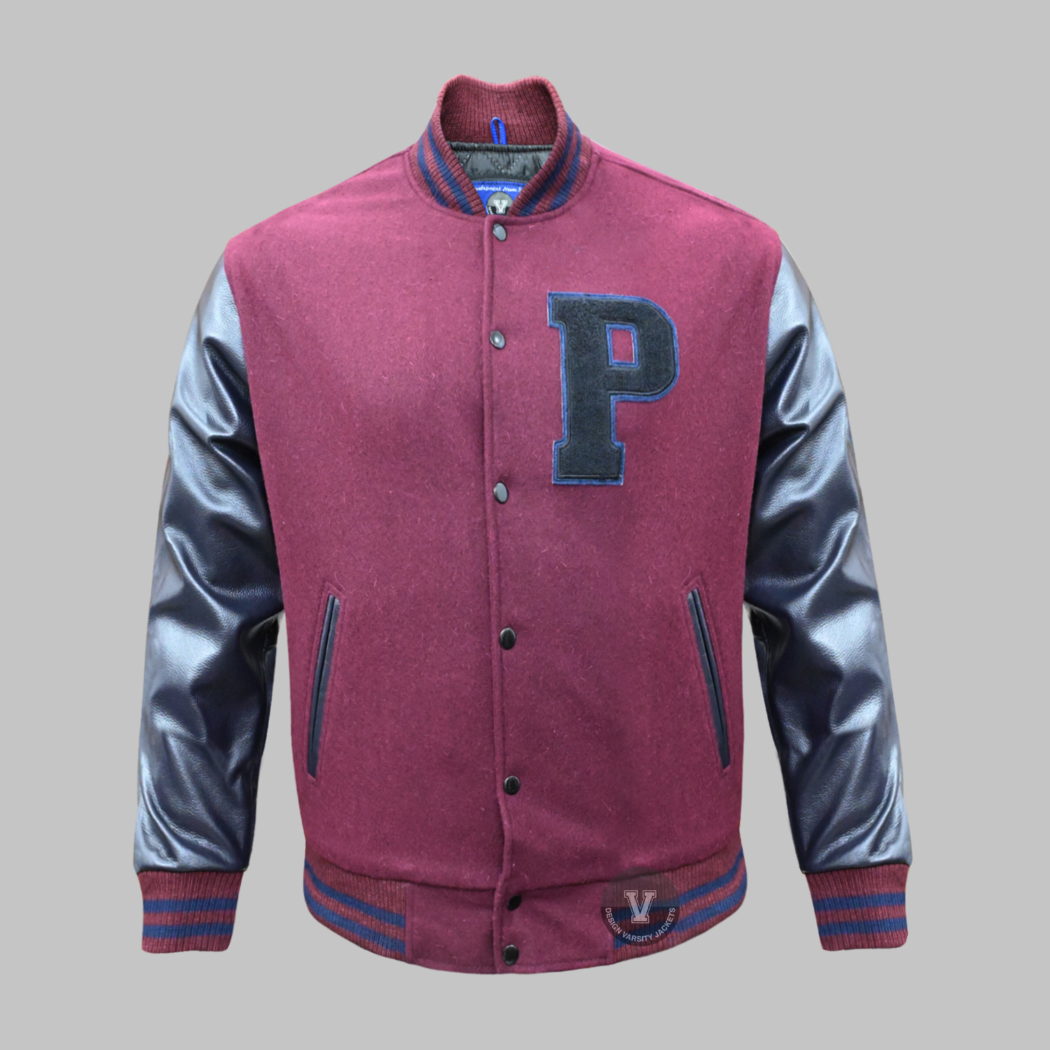 Front view of embroidered patches varsity jacket in wool and leather design